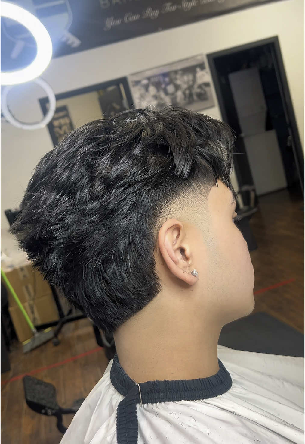 Low burst fade w/ a middle part •status barbershop  #barbers #barbershop #barber #barberlife #barbershopconnect #haircut #fade #barberlove #hair #barbering #hairstyle #barberworld #barbergang #wahl #beard #menshair #barbersinctv #hairstyles #thebarberpost #andis #barbernation #skinfade #style #haircuts #barberia #barbearia #barberlifestyle #nastybarbers #fadehaircut #barberpost