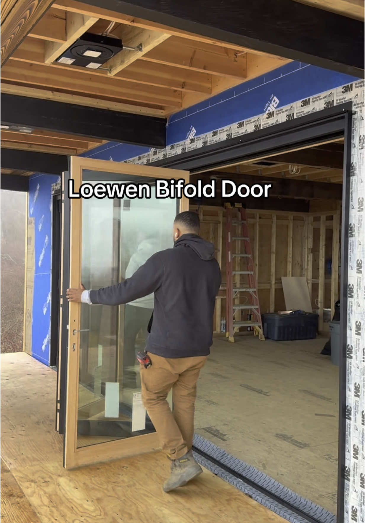 Loewen Bifold Door!! Great job by our guys on this Loewen installation! #reels #instagram #construction #tiktok #windows #bifolddoors #architect #installation #instagood
