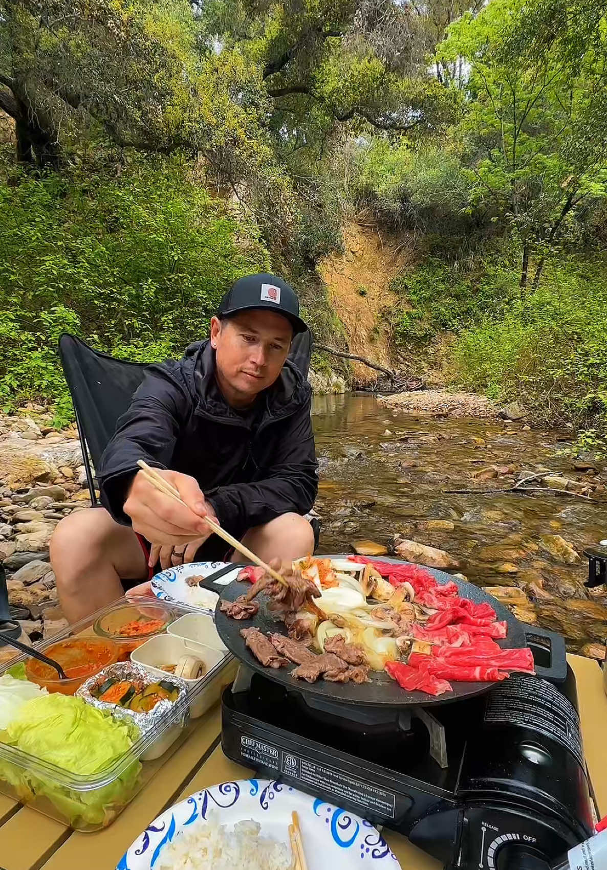 In my element cooking KBBQ by the creek, surrounded by nature. The sound of the water flowing, birds chirping, and all that lush green scenery it’s pure peace. Good food, good vibes, and the perfect escape. This is exactly how I like it! #KoreanBBQ #OutdoorCooking #NatureVibes #CreeksideCooking #FoodieLife #BBQTime #GoodVibesOnly #RelaxingViews #CookingWithNature #CampingEats #FoodAdventure #GrillMaster #WildernessCooking #ScenicViews #BBQLover #PeacefulMoments #EatOutdoors #FreshAirAndFood #BBQByTheWater #NatureEscape #WanderlustEats #FoodieAdventures #SimpleJoys #MindfulMoments #OutdoorLife