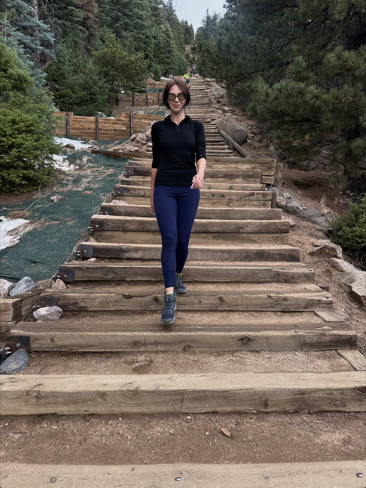 When in Colorado, you HAVE to try the Manitou Incline in Colorado Springs! 🥾   📍 Just 1 hour 30 minutes from Denver, this iconic hike is a must-do.   🚗 Reservations are required—mostly for parking spots, so plan ahead!   ☀️❄️ Be ready for weather changes. It can be sunny at the base and turn to snow or rain at the top.   💧 Bring plenty of water, make stops, and adjust to the high altitude.   🏔️ It’s a challenging 2,800 steps up, but SO rewarding! You’ll meet amazing people, feel the great energy, and the view from the top is absolutely breathtaking.   ⬇️ Once you’re at the top, you’ve got two choices:   1️⃣ Go back down the stairs, or   2️⃣ Take the scenic Barr Trail back to the parking lot—a gorgeous trail that shows off the beauty of Colorado Springs. (Trust me, the trail is SO much easier after all those stairs!)   🌟 Highly recommend this hike! It’s tough, but the views, the vibes, and the sense of accomplishment make it all worth it.   #ManitouIncline #ColoradoHiking #ColoradoSprings #BucketListHike