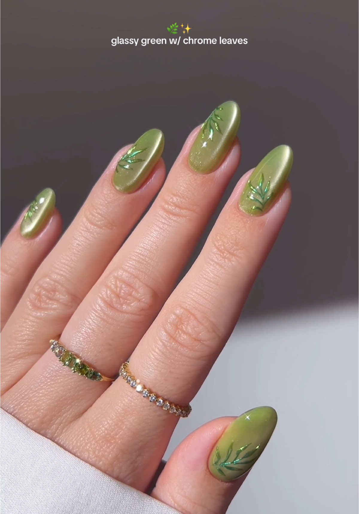🌿✨ glassy greens and shimmering leaves—like walking through an enchanted garden in spring 🍃 ✨ everything’s linked on my Am aZ 0n Sf _____ *affiliate #springnails #nails #nailinspo #diynails #naildesign #glassnails #nailtutorials #cateyenails 