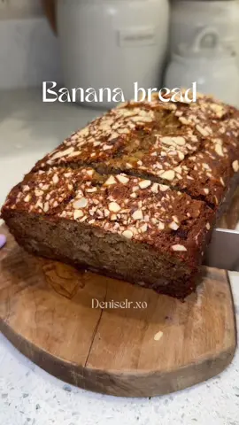 Banana bread 🍌🍞 Ingredients: Wet Ingredients: - 2ripe bananas, mashed - 1/2 cup melted butter - 1/2 cup white sugar - 1/2 cup brown sugar - 2 large eggs, beaten - 1/2 cup milk - 1 teaspoon vanilla extract Dry Ingredients: - 1 1/2 cups all-purpose flour - 1 teaspoon baking powder - 1 teaspoon baking soda - 1 teaspoon cinnamon -1 cup chopped almonds Instructions: 1. Preheat Oven: Preheat your oven to 350°F (175°C). 2. Prepare Pan: Grease a 4x8-inch loaf pan. 3. Mix Wet Ingredients: In a mixing bowl, mash the ripe bananas with a fork until smooth. Stir in the melted butter, white sugar, brown sugar, beaten eggs, milk, and vanilla extract until well combined. 4. Combine Dry Ingredients: In a separate bowl, whisk together the flour, baking powder, baking soda and cinnamon. 5. Combine Wet and Dry Ingredients: Gradually mix the dry ingredients and almonds into the wet ingredients until just combined. 6. Pour Batter: Pour the batter into the prepared loaf pan. 7. Bake: Bake for 60-65 minutes, or until a toothpick inserted into the center comes out clean. 8. Cool: Let it cool in the pan for a few minutes, then transfer to a wire rack to cool completely. Enjoy your delicious banana bread! 🍌🍞 #bananabread#pandeplatano#pancasero#baking#BakeWithMe#creatorsearchinsights#cocinando#enlacocina#cocinaconmigo#mexicana#recetas#recetasmexicanas#comidamexicana#fyp#foryoupage#parati