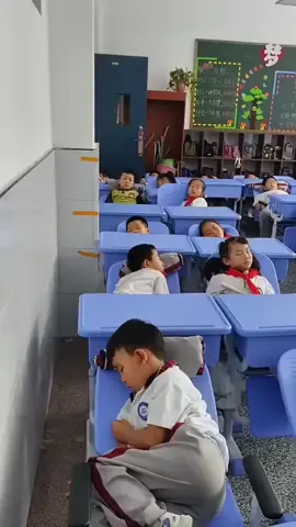 Chinese primary students take afternoon naps in their classrooms. #china #viraltiktok