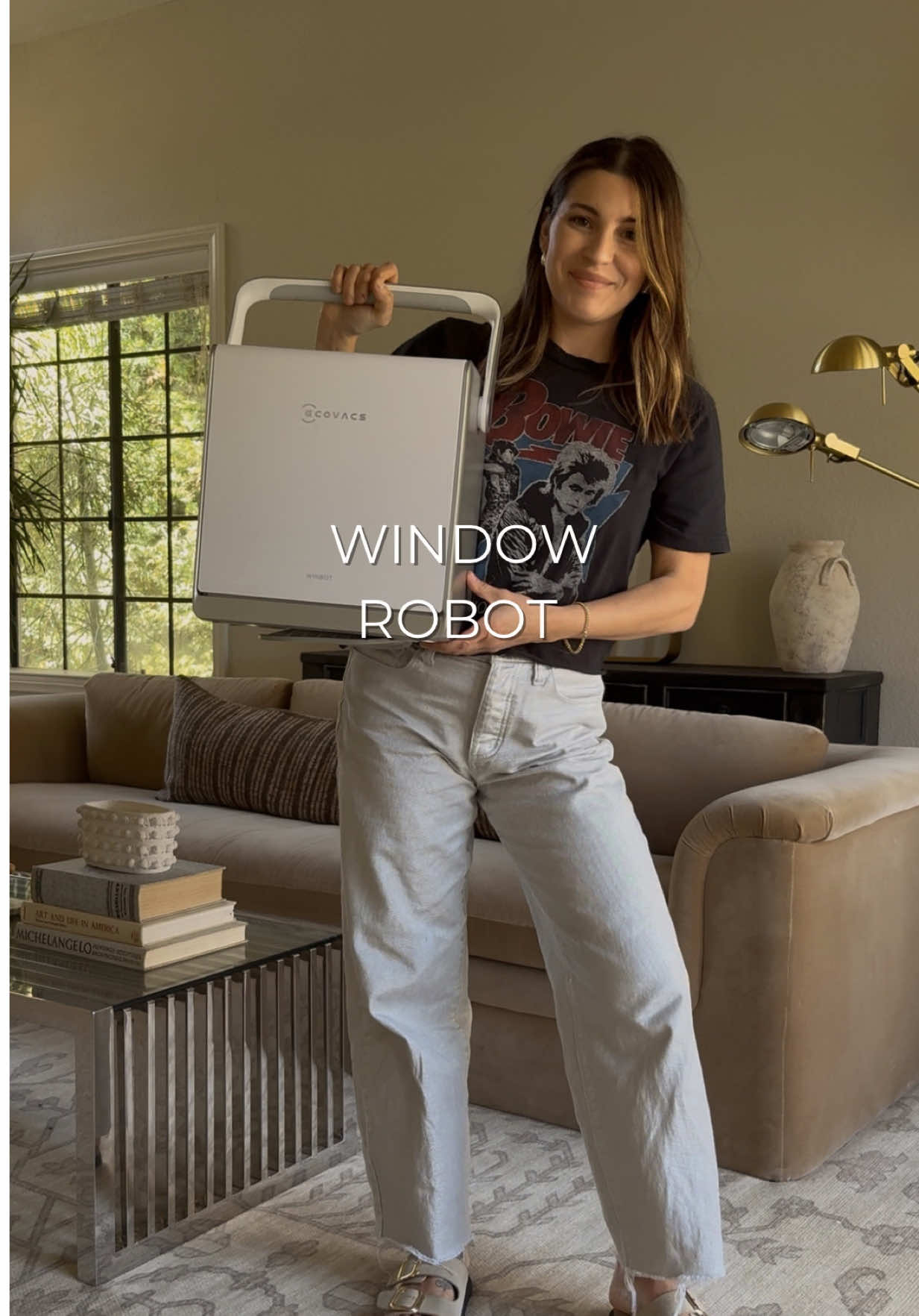 LOOK at this cleaning gadget! 🤯  🔗 is in my bio!!! AD This is the @ECOVACS Winbot W2 OMNI and this is my new cleaning best friend! I am a sucker for anything that makes my cleaning life easier and saves me money in the long run because I didn't realize how expensive it was to pay for someone to come and clean all your windows!!! You can use this on different types of windows, it's very quiet, has different cleaning modes and portable! It even self winds the cord back up when it's done being used! #Ecovacsglobal #Ecovacs #Windows #Cleaninghack #Cleaninghacks #Cleaningtips #Cleaning #Windowcleaning #Robot #Winbotw2omni