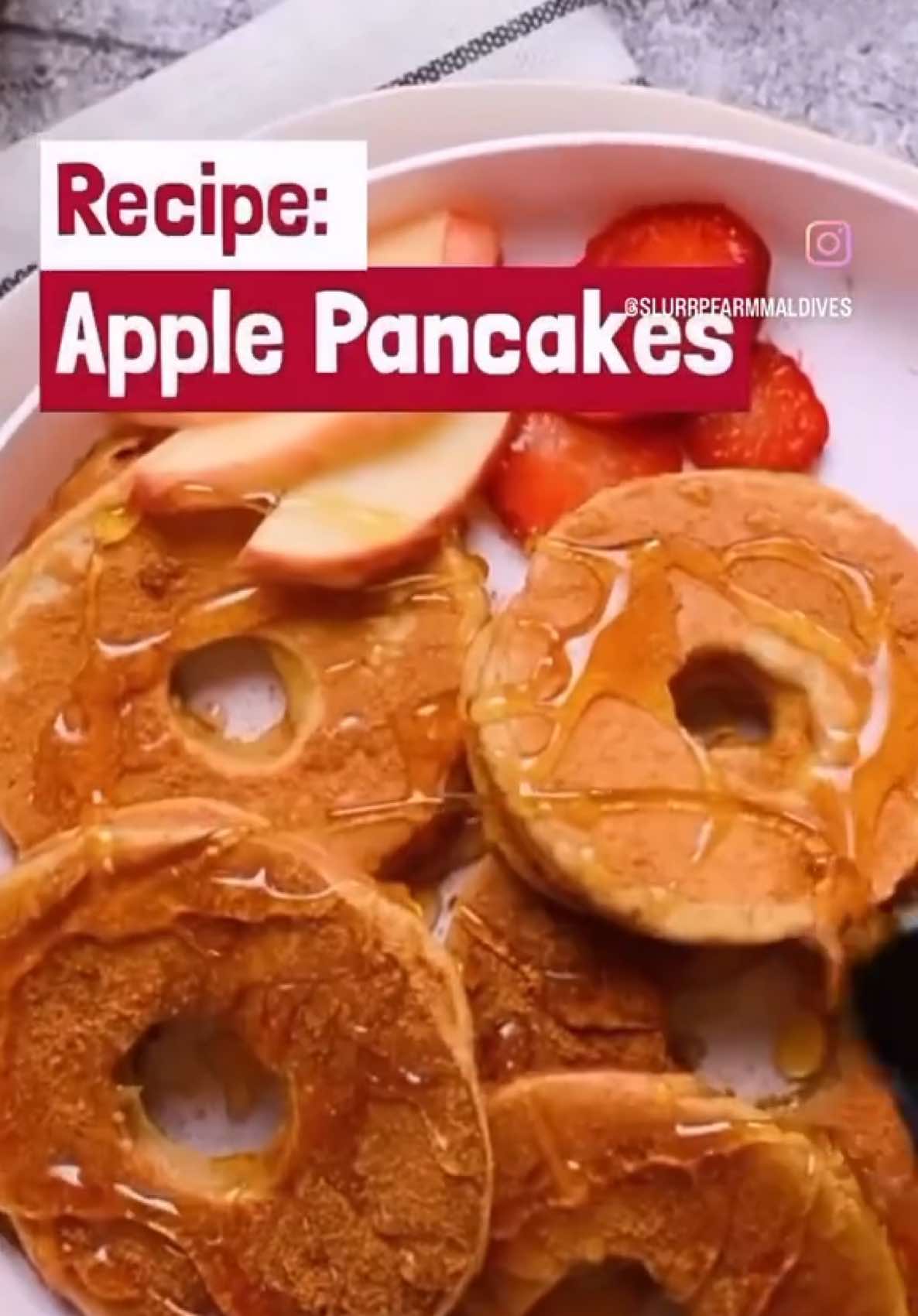 slurrpfarm Apple pancakes on some days keep your child's tummy happy all day. Give your little one's winter mornings a nutritious boost with these fluffy pancakes made using Slurrp Farm Millet Classic Pancake Mix. It has no maida, no refined sugar - only wholesome millets and fresh apples to add a sprinkle of holiday joy to their day! Ingredients: + Slurrp Farm Millet Pancake Mix + Milk + Eggs + Cinnamon & date powder mix + Apples Method: 💛In a bowl, mix the pancake mix, eggs, and milk until you have a smooth batter. 💛Slice apples into rings and remove the cores to create a hole in the center of each slice. 💛Dip the apple slices in the pancake batter, ensuring they're coated well. 💛Cook the coated slices on a hot pan until golden brown on both sides. 💛Sprinkle a mix of cinnamon and date powder on top for extra flavor. 💛Drizzle with honey and serve hot. #Slurrpfarm #Slurrpfarmmaldives #Maldives #MadebyTwoMothers #ZeroJunkPromise #Recipes #healthyrecipes #Pancake #Holidays #breakfast #toddler #kids 
