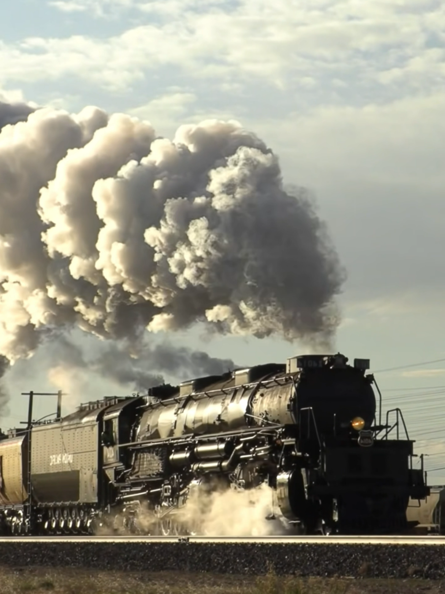 Big Boy Steam Locomotive 4014 - The Sound of Steam 3 #SteamEngineTrain #VintageTrains #RailwayHistory #IndustrialRevolution #SteamTrain #ClassicTrains #TrainLovers #TrainJourney #HistoryInMotion #LocomotivePower #SteamPower #TravelBackInTime #TrainsOfThePast #FYP