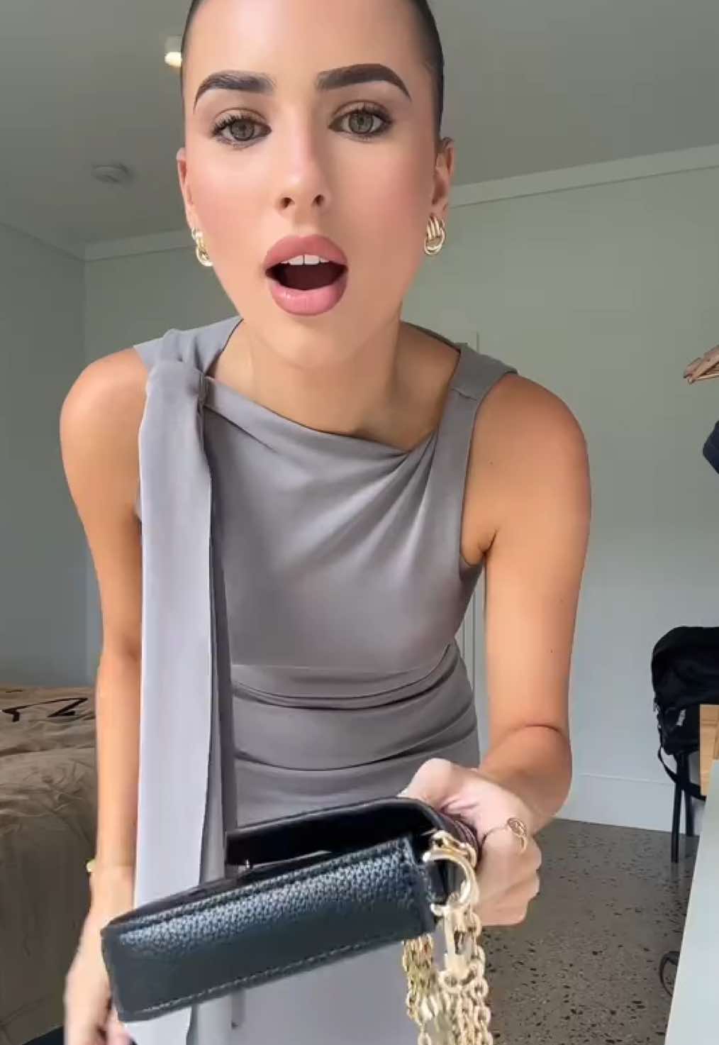 @Zoe wearing the sueded stretch knotted maxi dress in steel grey. shop now on khy.com
