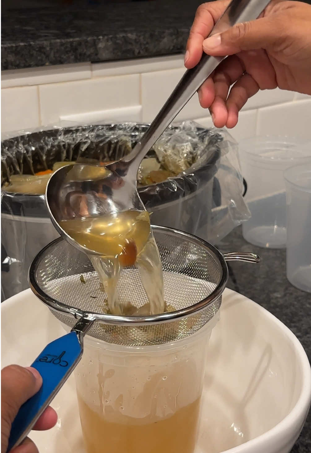 Who knew chicken stock was so easy? Apparently me because I filmed this @ 5 am 😭😭😭 Recipe: Take a freezer bag full of “old veggies” I used celery, carrots, onions, cabbage and chicken bones (I used a rotisserie) and dump into a crockpot. Season with rosemary, thyme, salt, pepper, and bay leaves. Cover completely with water and let cook on low as long as you can. I did 12 hours. Strain your stock into containers or freezer bags. Cool in water bath with a lid vented until room temp and then refrigerate. After a few hours, scoop any fat off and freeze ☺️ Lasts a week in the fridge, 3 months in the freezer.  #homemade #chickenstock #rotisserie #fromscratch #cookwithme #cottagecore #tiktkfood #meghanmarkle