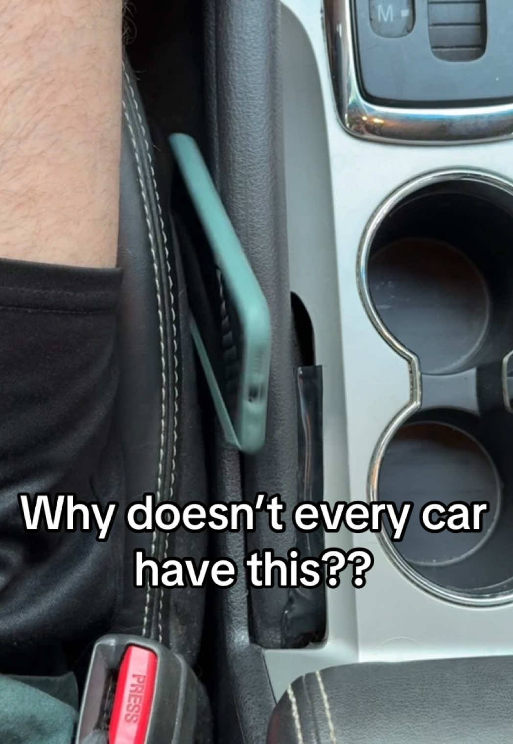 A car accessory that stops items from falling between the seats in the gap and is also storage??? This will be in every car soon enough fr  #carseatgapfiller #caraccessories #carseat #carhacks #carseathack 
