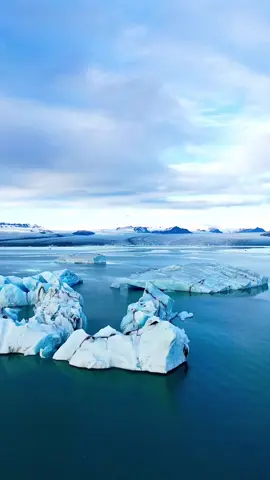 Jökulsárlón (Glacier lagoon), Iceland 🇮🇸 The Glacier lagoon in Iceland is about 370 km (230 miles) east from Reykjavík and it is told to be one of the greatest wonders of nature in Iceland. This lagoon is a recent one, the result of a warming climate. The surface is at sea level and sea water flows into the lagoon at high tide. ✨ Wow! ✨ #theplacetobe #glaciernationalpark #glacier #iceland 