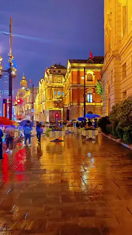 welcome to China🇨🇳，The streets of Shanghai on rainy days are so beautiful!If you are visiting China for the first time, I will tailor a 10-15-day itinerary for you, covering the most representative cities, cuisines, history and culture of China. Please contact me if you are interested。#China  #shanghai #city #trip #scenery #night 
