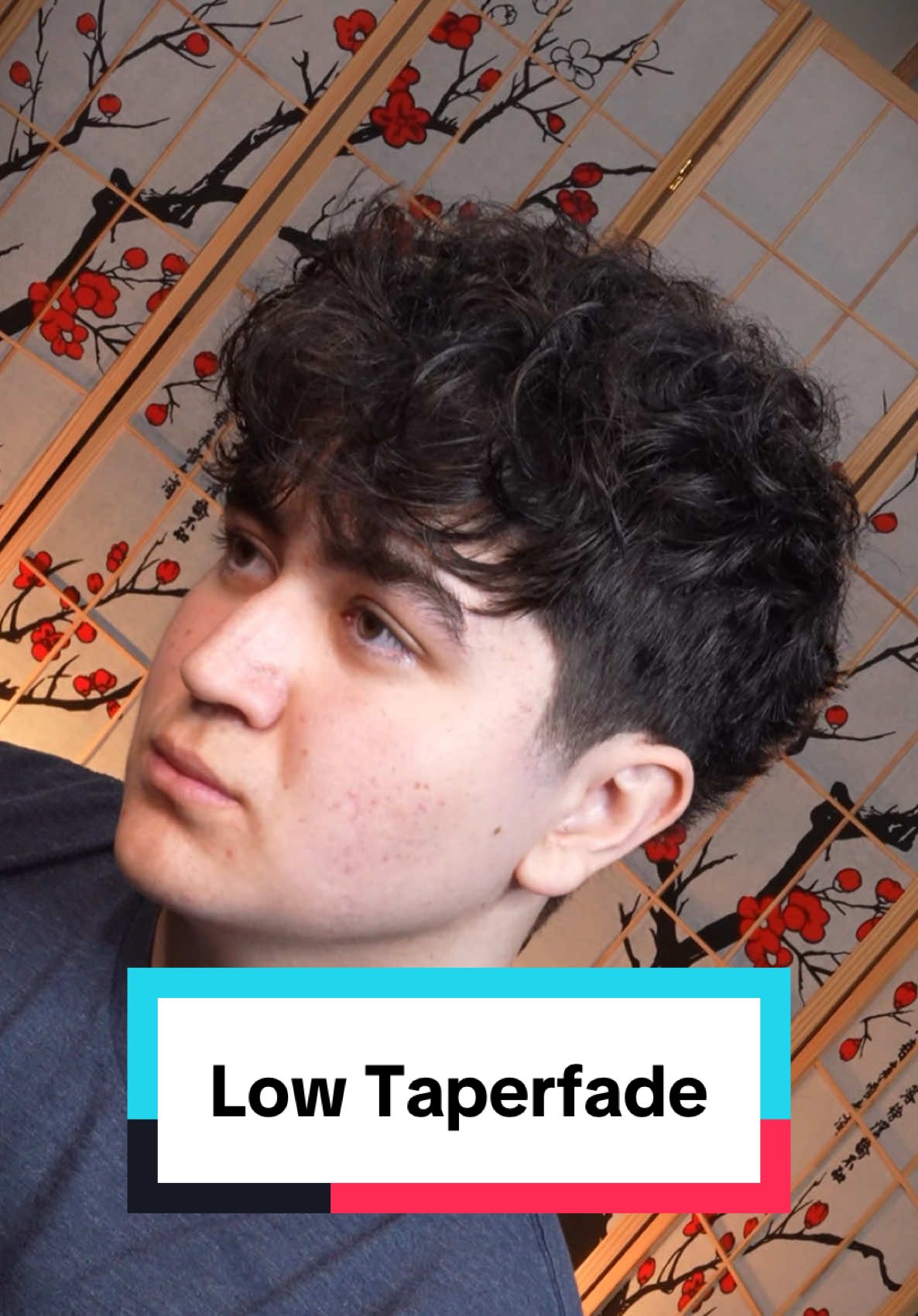 Low Taper Fade Textured Fringe His mom hates his haircut. She needs to cut it and get rid of his bushy hair. He wanted a hairstyle that covers his forehead so I recommended a textured fringe with a low taper fade. Did I save him? If you’re in Seattle, click that link in my bio to book with me! #asianbarber #seattlebarber texturedfringe #asianhair #haircut 