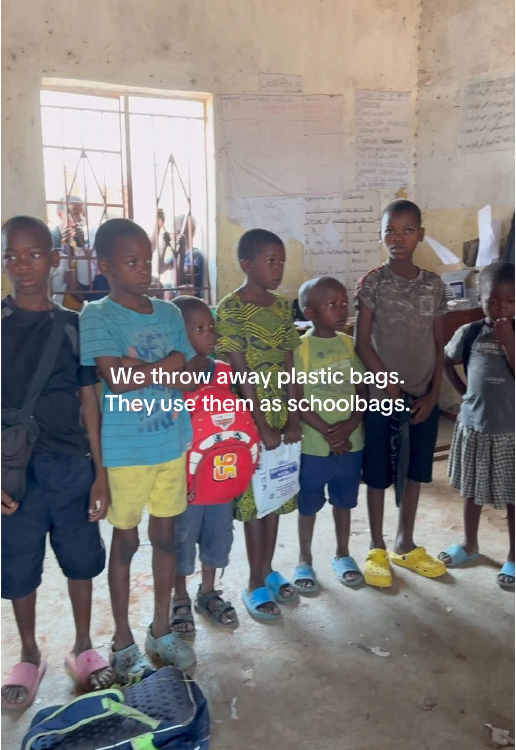 We throw away plastic bags. They use them as schoolbags. How unfair is this world.
