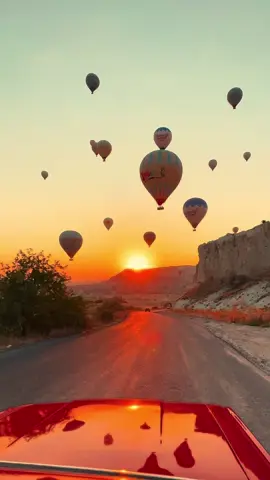 Sunrise with Balloons, Adventure All Day 🚗 A day in Cappadocia begins with hundreds of hot air balloons rising into the sky… You can contact us for a photo shoot during the day in the unique valleys of Cappadocia with classic cars and balloons. We’ve planned a full experience just for you. 📍 For details and bookings WhatsApp:+90 537 789 99 50 #CappadociaTour #BalloonExperience #ClassicCarRide #UnforgettableViews #TravelMoments #CappadociaAdventure #TurkeyTravel #SunriseMagic #ExploreMore #travelwithus 