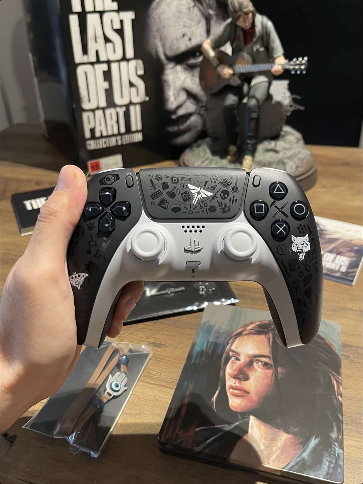 The Last of Us DualSense controller 🎮 The DualSense The Last of Us Edition has just arrived, and it’s absolutely stunning in person! Every detail tells a story—every symbol etched into its design is like a trophy from the game itself. The textures, the colors, the intricate nods to iconic moments—it’s a masterpiece for any TLOU fan. If you’re a gamer who treasures both gameplay and design, this controller is a must-have.                                         Who else is hyped to use this beauty for their next adventure? #TheLastOfUs #DualSense #PlayStation5 #TLOUFans #GamingGear #PS5Controller #GamingSetup #GamersLife #TheLastOfUsPartII #GamingCommunity #PlayStationAccessories