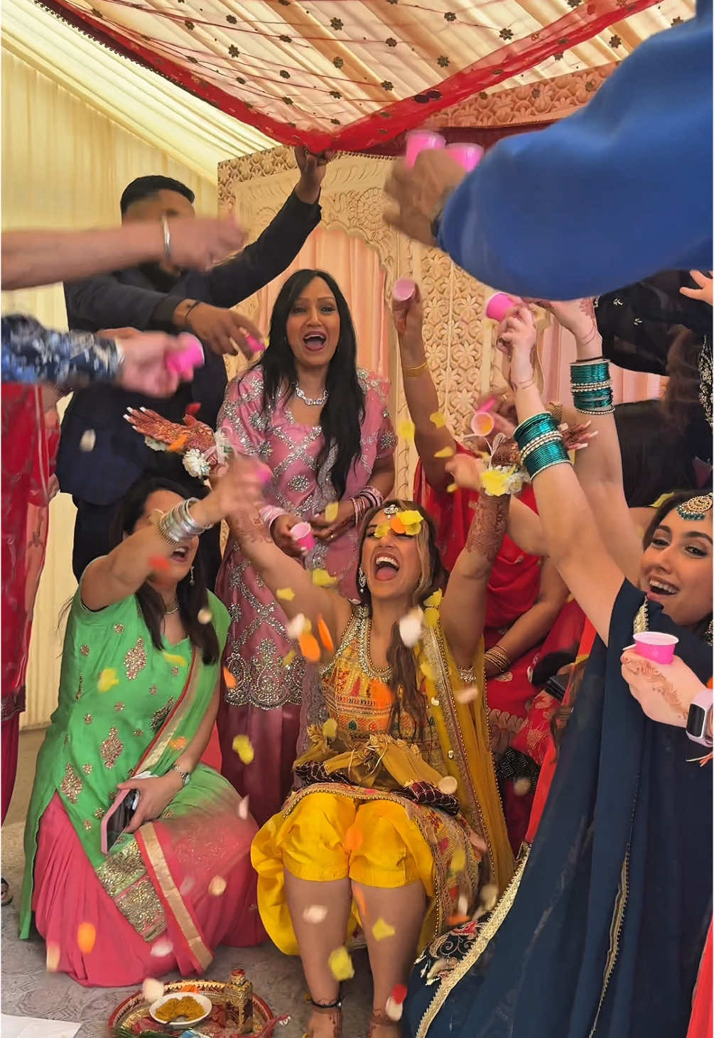 I loved this idea of doing a petal toss after your Maiyan !  #punjabi #punjabiwedding #maiyan #weddingidea #trending #videoviral #fyp #fy #fypシ゚ #suits #maiyan #choora #mehndi #contentcreator #weddingcontent #punjabitiktok #punjabisong #desi #desitiktok #flowers #petals ##family #haldi #maiyanceremony #sikh #sikhwedding #punjabicouple 