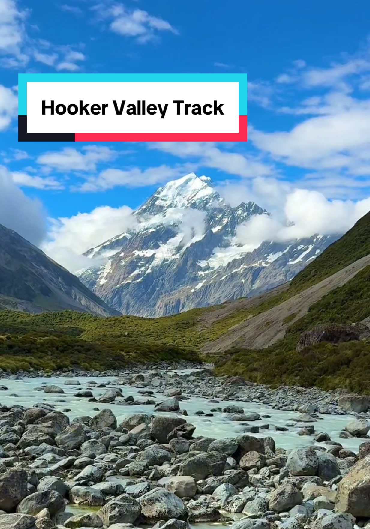 Hooker Valley Track in Mount Cook National Park in New Zealand is a bucket list hike! The views of Mount Cook were so incredible, along with all of the glacial rivers that we crossed over. #mountcooknationalpark #mtcook #mountcook #newzealand #newzealandtravel #hiketok #newzealandhikes 