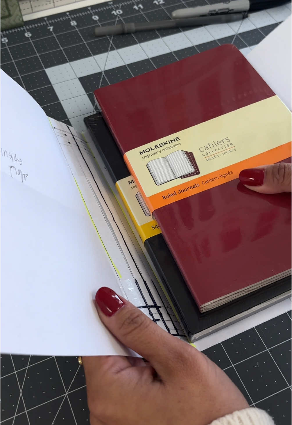 i love a good side quest!!! i’m making a louise carmen inspired journal cover on a michael’s budget. finishing it up soon! here’s my supply list: * leather (big enough for 8.5 x 17ish) * 2mm grommets (mine are 3.9 🥲) + closure tool * mallet * leather hole punching kit * jewelry tools * elastic cording  * charmsss + jump rings * cutting mat * rotary blade  big thanks to these creators who were a huge inspiration!! @katie turner | styletongue @Danielle Lacoste @Michaela B. 💙💙 @Moleskine @Michaels Stores #journaling #louisecarmen #journaltok #diyjournal 