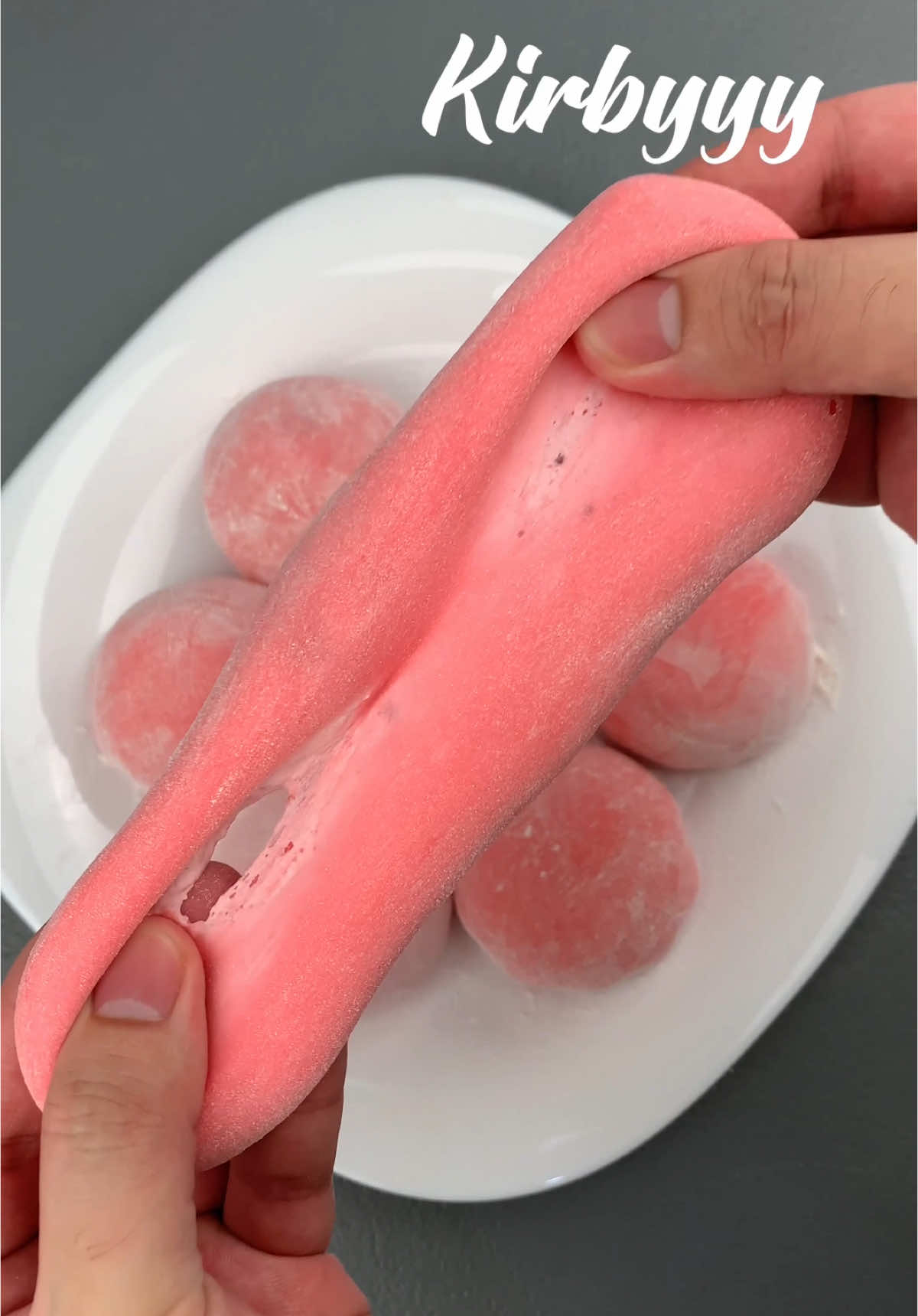 Homemade Strawberry Mochi Homemade Strawberry Mochi ingredients: 100g glutinous rice flour 35g cornstarch 30g sugar 180ml fresh milk 4 drops red food color 15g butter microwave for 3 mins, mix and microwave again for another 2 mins filling: 200ml whipping cream 1-2 tbsp condensed milk 2-3 tbsp strawberry filling #kirbyyy 