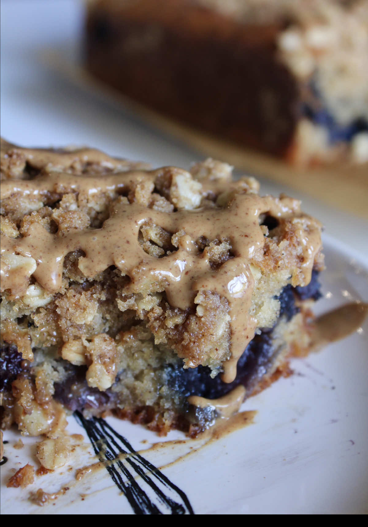 This blueberry crumb cake it’s so good !!! Ingredients - 100g Almond Flour - 150g Gluten-Free Flour - 2 Eggs - 1/2 cup Sugar or Honey - 3/4 cup Yogurt - 1 Tbsp Baking Powder - 1/2 tsp Baking Soda - 1 tsp Cinnamon - 1/4 tsp Salt - 1 stick Butter - 2 Tbsp Olive Oil - Vanilla Extract - 1 cup Blueberry Crumb Crumb Topping - 1/4 cup GF Flour - 1/3 cup Oatmeal - 1/4 cup Brown Sugar or Coconut Sugar - 1/3 cup Melted Butter - Cinnamon In a bowl, mix all the ingredients and let it rest. Steps 1. In a bowl, mix the flour, sugar, baking powder, baking soda, cinnamon, and salt. 2. Separately, mix the eggs, yogurt, melted butter, olive oil, and vanilla. 3. Once well blended, add all the dry ingredients in the other bowl. 4. Stir well until everything is well incorporated, then add the blueberries. 5. Grease your 8x8 pan and pour your bread dough into it. 6. Spread the crumb topping evenly on top. 7. Preheat the oven to 350°F and bake for 40 minutes. 8. Enjoy!  #blueberry #healthyrecipes #EasyRecipe #blueberrycrumb #cake #CapCut