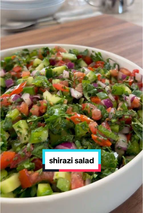 MIDDLE EASTERN SHIRAZI SALAD is an absolute staple in my house, and has been since I was a child!Although Shirazi has Persian origins, Armenians enjoy a very similar version—I love when flavors overlap from different cultures! This is such a fresh and herbaceous dish that screams Spring! I could eat the entire bowl on its own, but it’s fantastic as a side dish or scooped up with crackers. The key to this salad is chopping the veggies finely, which can be a pain in the a** and time consuming, unless you use the viral veggie chopper! You can chop all the veggies in a few min flat!⁣ ⁣ Comment LINK or CHOPPER and I will DM you the link! 🔗 ⁣ ⁣ Makes 4 servings ⁣ Salad:⁣ 4 Persian cucumbers, finely chopped⁣ 3 Roma tomatoes, finely chopped ⁣ ½ red onion, chopped⁣ 1 green bell pepper, seeded and finely chopped ⁣ 1/4 cup cilantro, chopped⁣ 3 tb parsley, chopped⁣ 1/4 cup fresh mint, chopped⁣ ⁣ Dressing:⁣ 1/3 cup extra virgin olive oil⁣ 1/4 cup fresh lime juice (1-2 limes)⁣ 2 tsp sumac (optional but highly recommend)⁣ 1/2 tsp kosher salt⁣ 1/2 tsp black pepper⁣ ⁣ Chop all of your ingredients finely. Drain as much of the liquid from the tomatoes as possible, so the salad isn’t soggy! Add all of the salad ingredients to a large bowl. Next, make the dressing by whisking together all of the ingredients listed above. Pour over the salad, toss and enjoy!