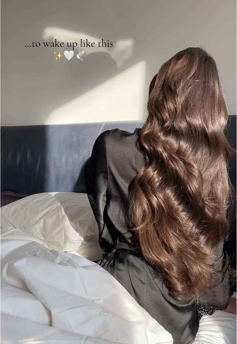 I sleep with a silk hair cap every single night. It helps reduce friction and moisture absorption against your pillowcase. This will help tame frizz, enhance shine, reduce dryness, breakage and tangles. Before putting the cap on I apply a few drops of hair oil on my lengths, the cap helps lock in moisture further which leaves hair softer and smoother. The cap and hair oil I use are @CELUI by Anisa Sojka #hairtok #hair #hairtransformation 