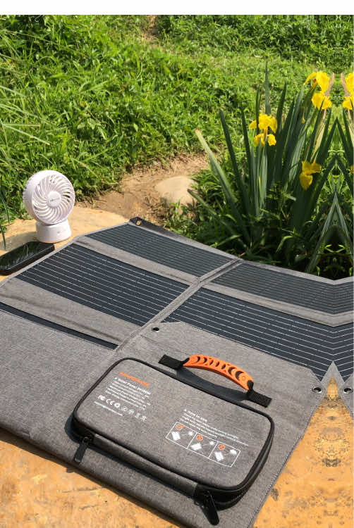 Take Solar Power Anywhere with Portable Solar Panel! With 4 output ports, it can charge everything from your phone to your laptop and power bank! #solar #overlanding #chage #travel #Outdoors #camping #portable #mhpowos 