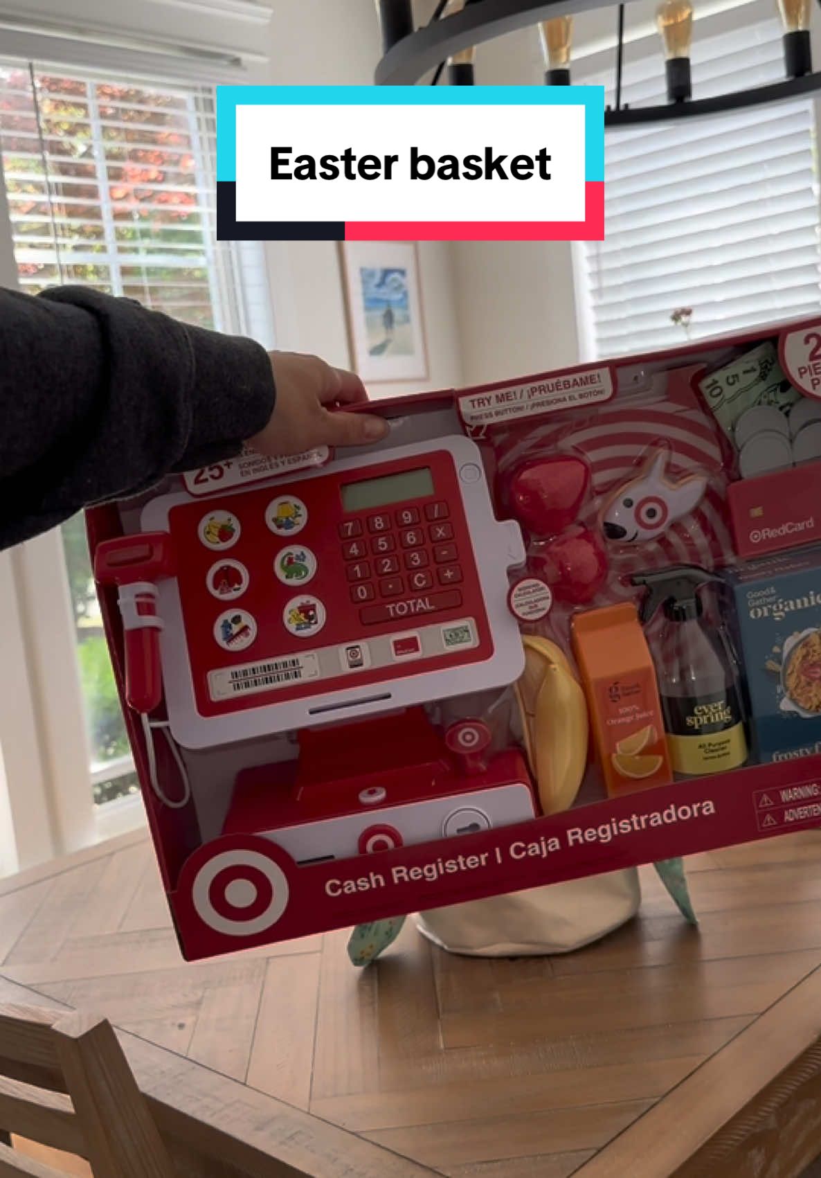A realistic Easter basket to hopefully help your timeline feel a little less crazy 🤪  #underconsumption #deinfluencing #easterbasket #toddlereasterbasket #parenting #mom #motherhood 