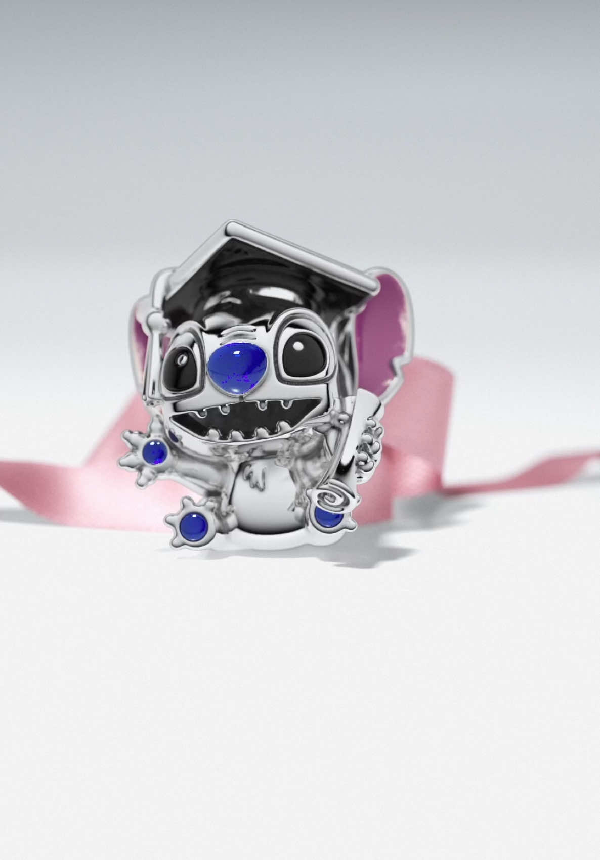 Bite into a bright future. Celebrate your graduation with everyone’s favourite troublemaker, Disney’s Stitch, who’s all dressed up for the occasion. 🌺🎓  #DisneyxPandora #Graduation2025 #PandoraCharms  