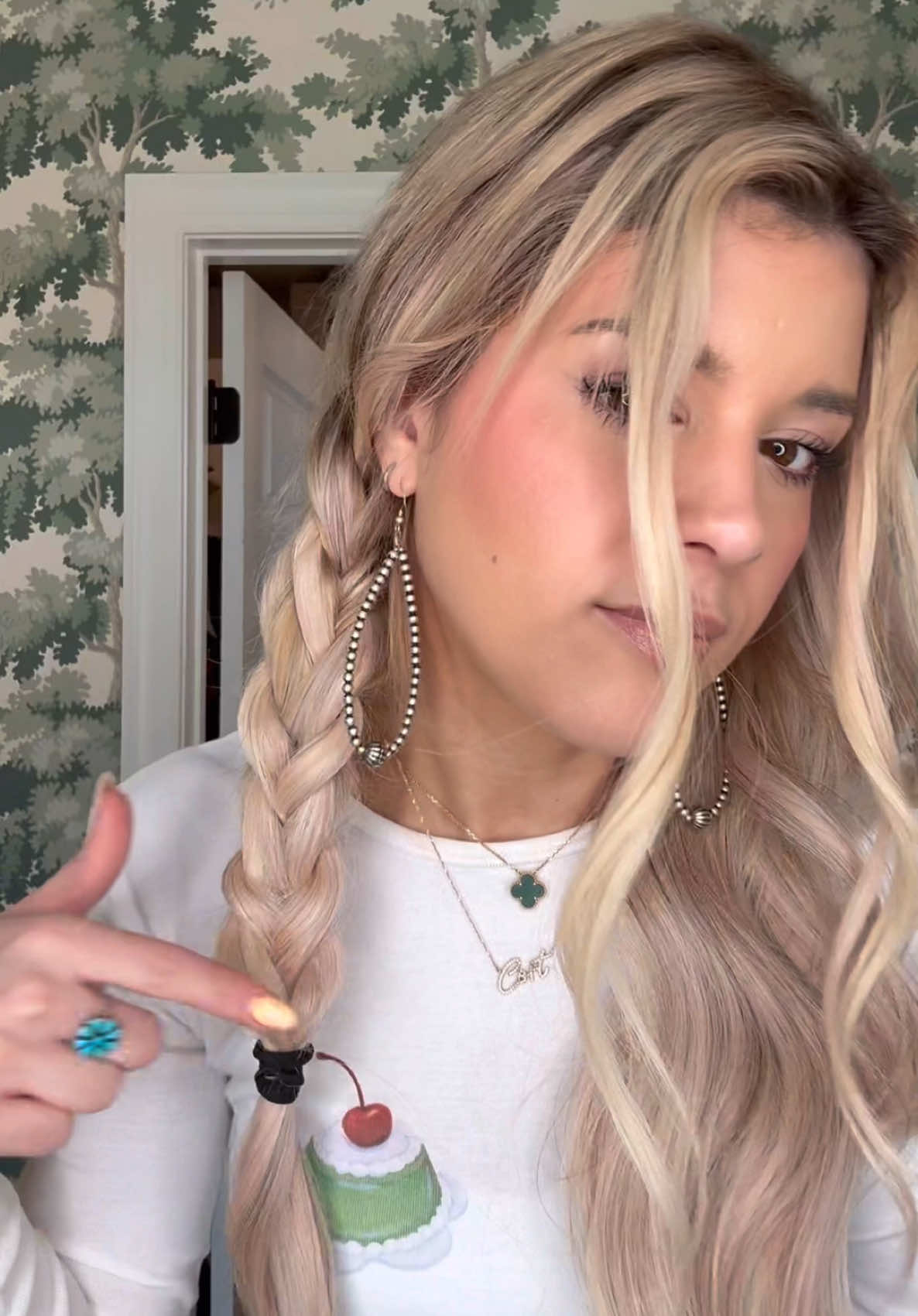 I think this way gives more volume, avoids the major braid crimps, and is WAY better for those with layers because it keeps them all in! 