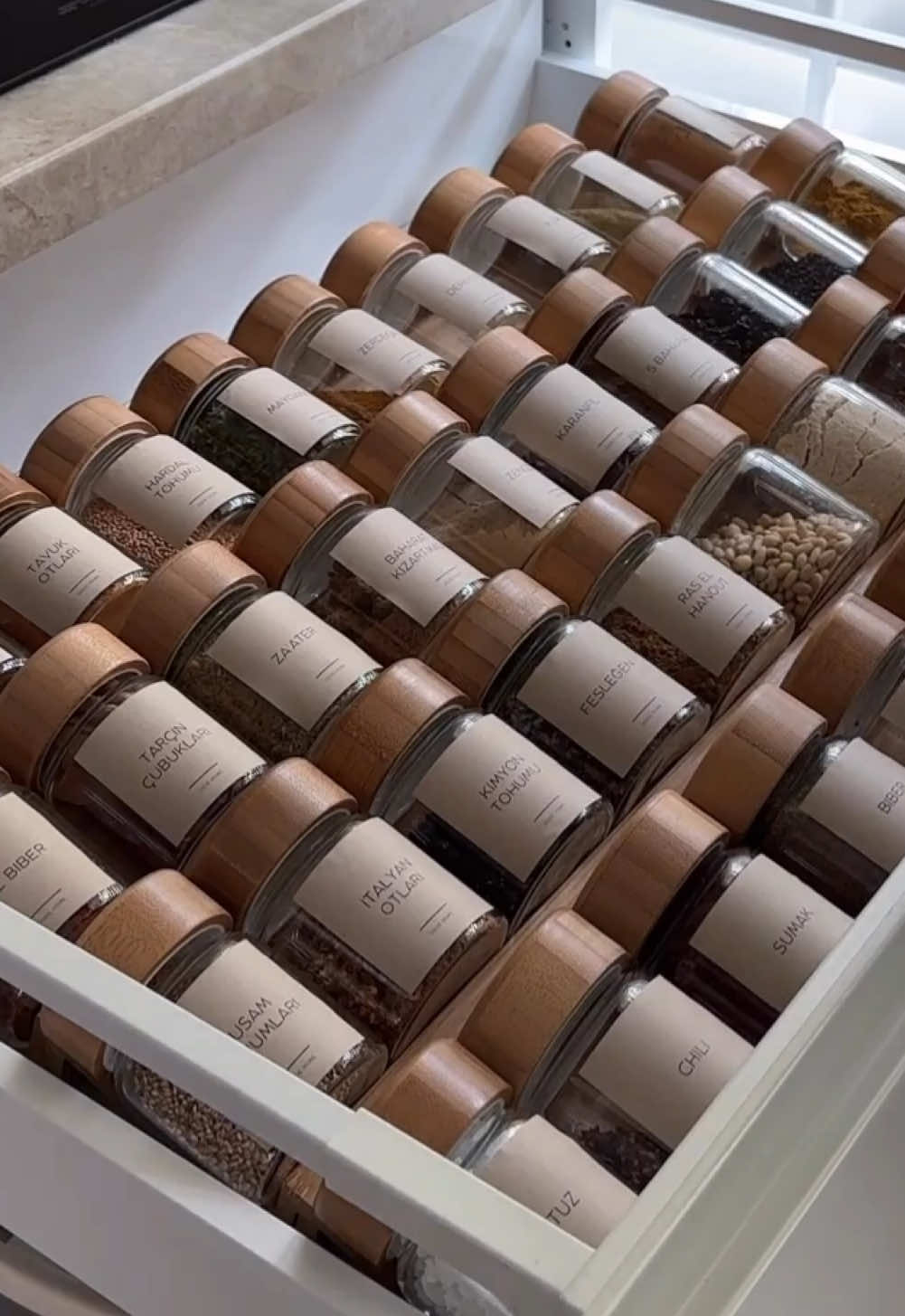 Instant overview = less stress. 💭 When all jars are the same shape and the labels face upward, you can immediately see what you need. No digging, turning, or guessing = calm cooking. Besides this, a spice drawer like this: 1. Saves time Looking for “cumin” but it’s hiding behind five different jar 🫙 shapes? That chaos adds up. Uniform jars and labels reduce the time it takes to grab what you need—especially when cooking gets hectic. 2. Keeps things tidy Identical jars fit together neatly, making the drawer look and feel organized. You avoid that jumble of spice packets and random containers. 3. More space, better storage Standardized jars take up less room than mismatched packaging. Lying them in a rack means they’re stacked neatly, not piled or tipping over. 4. Aesthetics = peace ✨ Let’s be honest—opening a drawer and seeing beautiful, matching jars just feels good. It’s a little moment of calm in your day, and it makes your kitchen feel more intentional. 5. Reduces waste You can refill the same jars over and over from bulk spices, which saves money and cuts down on packaging waste. ♻️ This is spice rack Dusan (restocked, be quick!) in combination with spice jar Yen. There are more matching jars available. If you also want to create more overview in your environment and experience piece of mind, head to www.osoehome.com #organizedkitchen #spicedrawer #kitchenorganization #declutteryourhome #mindfulspaces #aestheticstorage #spicejarlove #calmhomevibes #kitcheninspo #homeorganization #functionaldesign #simplifyyourspace #labels #slowlivinghome #spicejars #organizedliving #osoehome