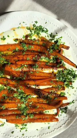truly a stand out dish to bring to your Easter meal! carrots roasted to bring out their natural sweetness layered over a creamy, garlicky whipped feta. ⁣ ⁣ 🥕spiced honey glazed carrots over whipped feta ⁣ ⁣ here’s how you make it:⁣ ⁣ whipped feta:⁣ 8 oz. feta⁣ 1 c. greek yogurt⁣ 1 lemon, juiced ⁣ 1 small garlic clove, minced⁣ 2 tbsp olive oil⁣ s+p to taste ⁣ ⁣ add all ingredients (except olive oil) to a food processor and pulse until it’s all incorporated. slowly pour olive oil in top spout of processor while it’s turned on and blend together until smooth and creamy. place in fridge until ready to assemble. ⁣ ⁣ roasted carrots:⁣ ⁣ 2 tbsp olive oil, divided⁣ 1 1/2 lbs carrots, peeled and sliced in half (lengthwise)⁣ 1 tablespoon sumac ⁣ 2 tbsp aglio olio seasoning blend (from Trader Joe’s- but you can also just use garlic powder here)⁣ 1/2 tsp salt⁣ 2 tbsp butter⁣ parsley, chopped for garnish⁣ honey⁣ ⁣ toss carrots in 1 tbps olive oil, sumac, aglio olio seasoning, salt. ⁣ add 1 tbsp olive oil to a large pan and turn to medium heat.⁣ add carrots, after 5-7 minutes, add butter to the pan and baste carrots in the butter sauce. ⁣ Remove carrots and add to a roasting pan. put in oven at 400 for 20 minutes, flipping halfway through  (set aside the butter sauce, you will use it at the end of preparation)⁣ ⁣ on a large serving platter, spread the whipped feta into a thin layer. Add roasted carrots and top with the butter sauce. ⁣ squeeze honey over the top and serve⁣ ⁣ ⁣ ⁣ ⁣#easter #easterdinner #seasonalcooking #easterbrunch #eastermeal #easterfood 