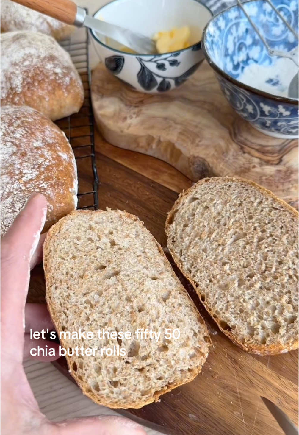 50/50 Ciabatta Rolls  Dough: 420ml lukewarm water 7g instant yeast  40ml Olive Oil  250g wholemeal bread flour  250g white bread flour  1/2 tbs salt  Whisk the water and the yeast together, add the oil and whisk again. Add both flours and salt and mix really well till everything is combined. Scrape the sides of the bowl with a dough scraper or spatulas and push the dough up into a ball. Cover a rest 30 min, After 30 min do 4 x stretch and folds, with a wet hand and turning the bowl after each one. Cover and rest 30 min. After 30 min repeat with 4 stretch and folds. Cover and rest 1 hour. Preheat your oven to 240C and add a small tray at the bottom with cold water to heat with the oven. Grease a large oven baking dish and add parchment (so it doesn’t move around.  Sprinkle the dough with flour and generously on your baking dish. Turn the dough out onto the dish, sprinkle the top of the dough with flour and cut into two pieces, gently shape into a rectangle and cut into 3, do the same on the other side so you have 6 rolls, using your scraper or metal spatula you can gently tidy the shape up and tuck the sides in but you can also leave them as they are they’ll still be amazing. Cover and rest for 20 min. Bake for 10 min at 240C  with the water inside, turn down the oven to 220C and take the water out. Bake for another 10 min. Enjoy D 🫶 #fyp #bread #ciabatta #wholemeal 