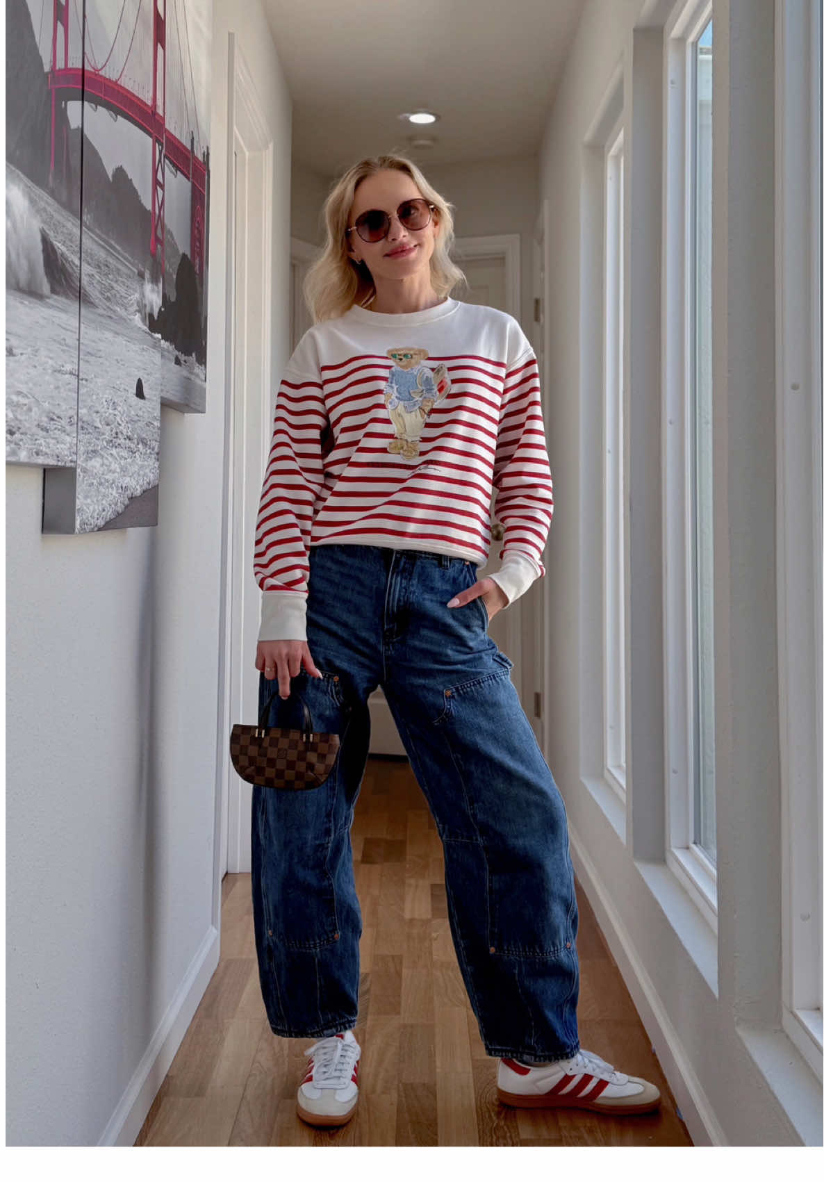 Friday fit check ✔️ Serving casual cool with a side of vintage vibes and a teeny tiny bag that holds nothing but big style energy. Would you wear this look? Comment 