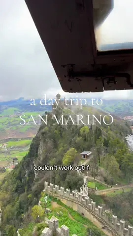 A side quest to San Marino! 🇸🇲 San Marino is the 5th smallest country in the world and the 3rd smallest in Europe. With it being so tiny you can easily see everything in a day and it’s a really interesting country so it’s well worth the visit!  You absolutely can fly into Rimini however flights here are less frequent and tend to cost more! It was cheaper for me to fly into Bologna and stay overnight and get the train the next morning, Florence is also a good one to fly into! The Sammarinese people are SO lovely and very eager to tell you about the country. I thoroughly enjoyed my time here and it’s actually one of the best mini solo trips I’ve done for a while! #sanmarino #sanmarino🇸🇲 #travelinspo #travelguide #travel2025 #traveltiktok where to travel, unique destinations, things to do in San Marino