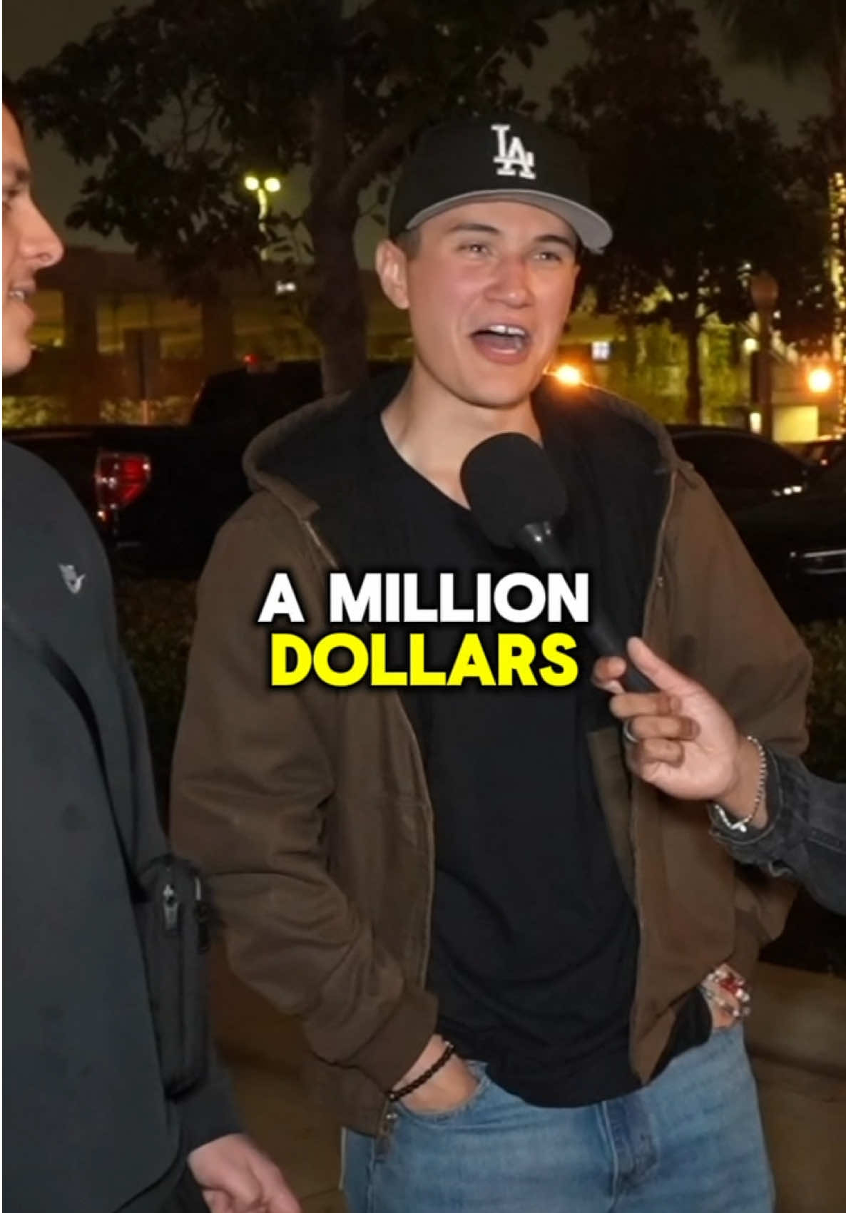 Young man says if he were to get 1 millions dollars upfront he would buy cars and jewelry with it #publicinterview #streetinterview #fyp #financetiktok #losangeles 