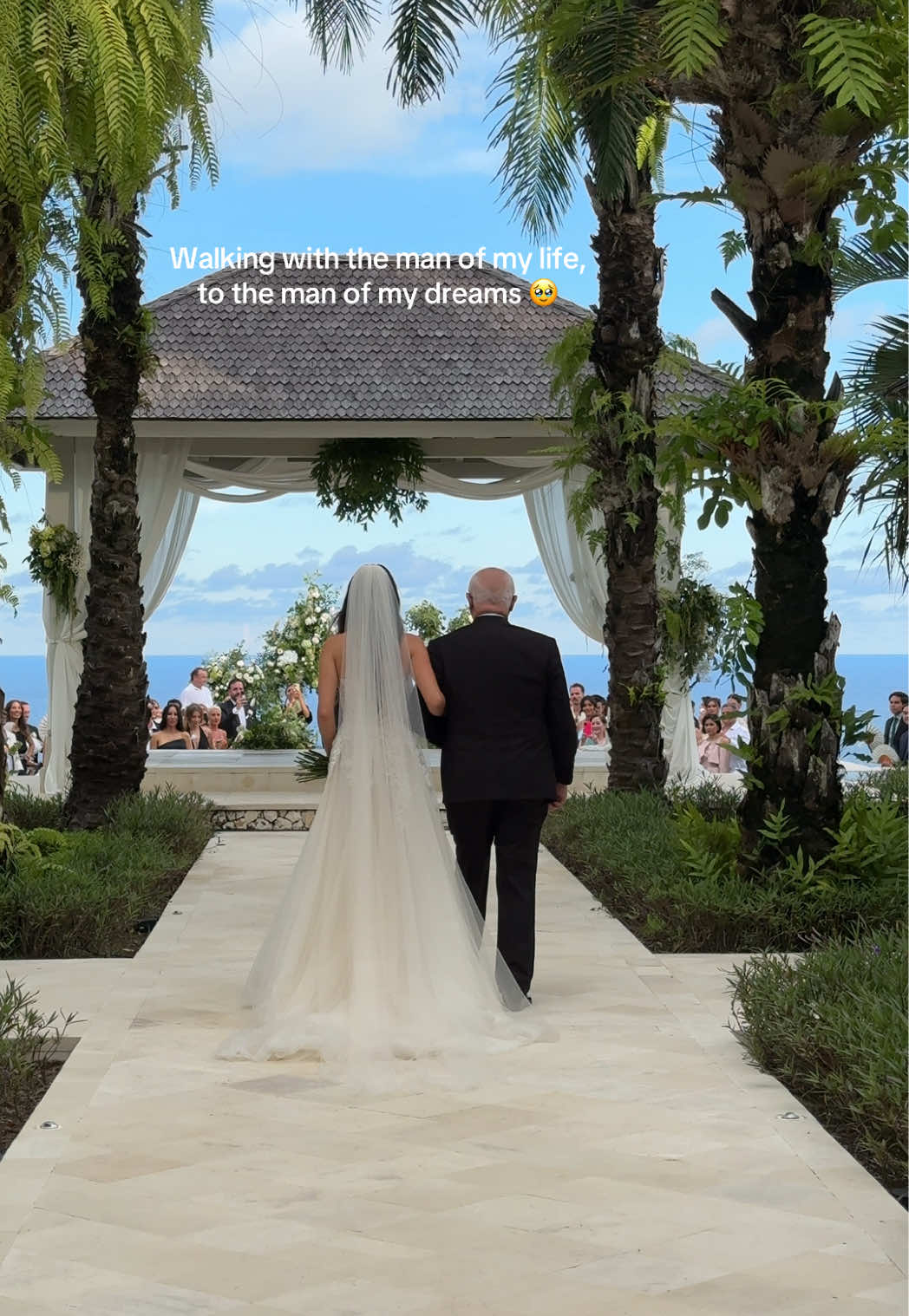 A moment I have dreaming of forever - my father walking me down the aisle. I love him so much. 🥹 📷  @Brides Wedding Content Creator  #walkdowntheaisle #fatherdaughter #quisthebride #wedding #corememory #weddingday #baliwedding #herecomesthebride #weddingmoments 