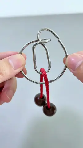 Can you remove the rope in the middle of the ring?#puzzle #iqtest 