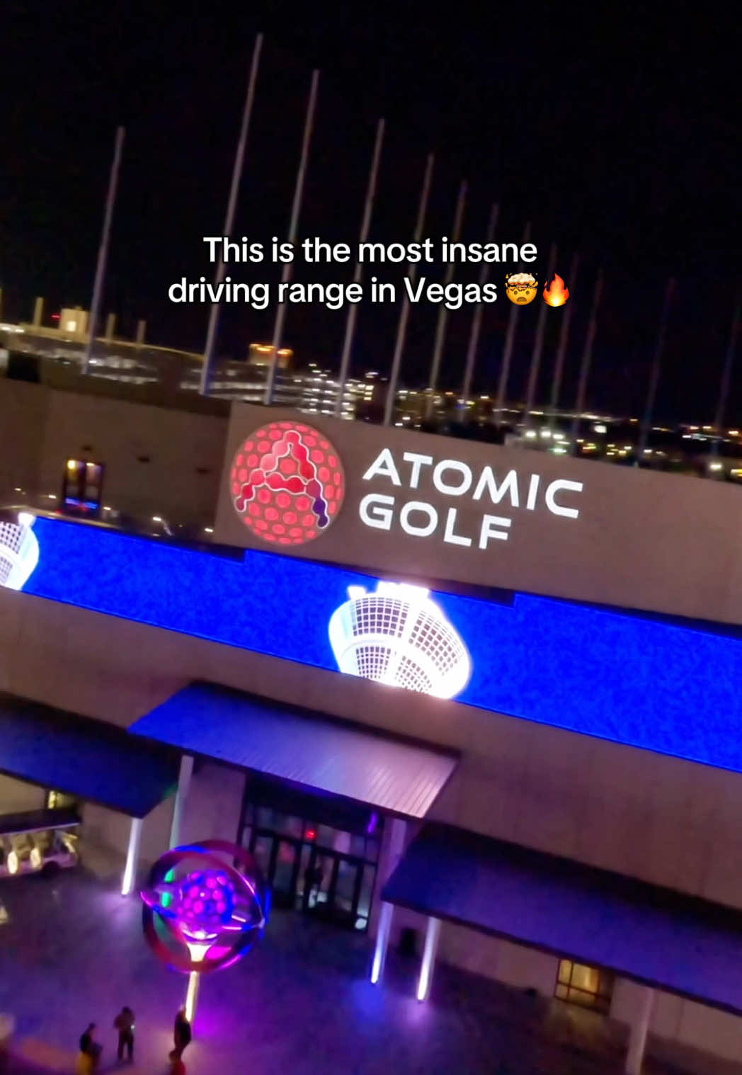 Who are you playing with here? 😳⛳️ This is the most insane driving range in Las Vegas.  📍 Atomic Golf, right off the Las Vegas strip next to the Strat.  #vegas #lasvegas #golf #golftiktok #golfcourse #drivingrange #golftok #golfer 