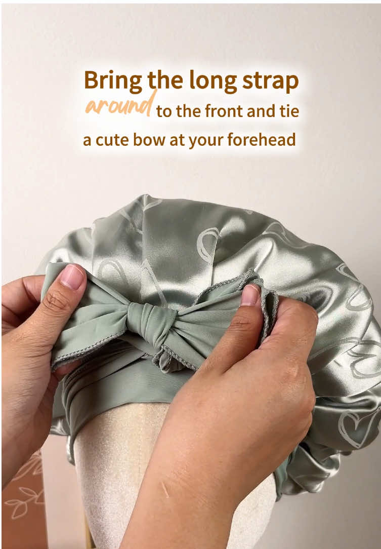 Tired of your bow looking sad or slipping off?  Let us show you how to tie it like a pro!#satinbonnet #giftsforher #giftsideas #mothersdaygiftideas #happymorhersday #yanibest #tiktokmakemebuyit #curlsroutine #SelfCare 