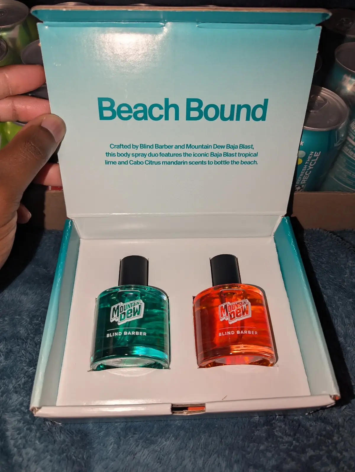 I have an extensive fragrance collection so when I saw that @Pepsi released two @Mountain Dew fragrances I had to get them. The two fragrances came with a case of soda, half regular Mountain Dew and half Baja Blast Mountain Dew. As for the fragrances, the green Baja Blast one is my favorite featuring a very unique tropical scent. The orange Cabo citrus scent smells like candied oranges in the opening, but dries down to something more like a smokey orange. They both only last 30 min on my skin, so they are definitely a novelty scents. However, at $25 or $30 shipped for everything I really can't complain.  #mountaindew #pepsi #fragrance #fragrancetiktok #fragrancereview #baja #bajablast #soda 