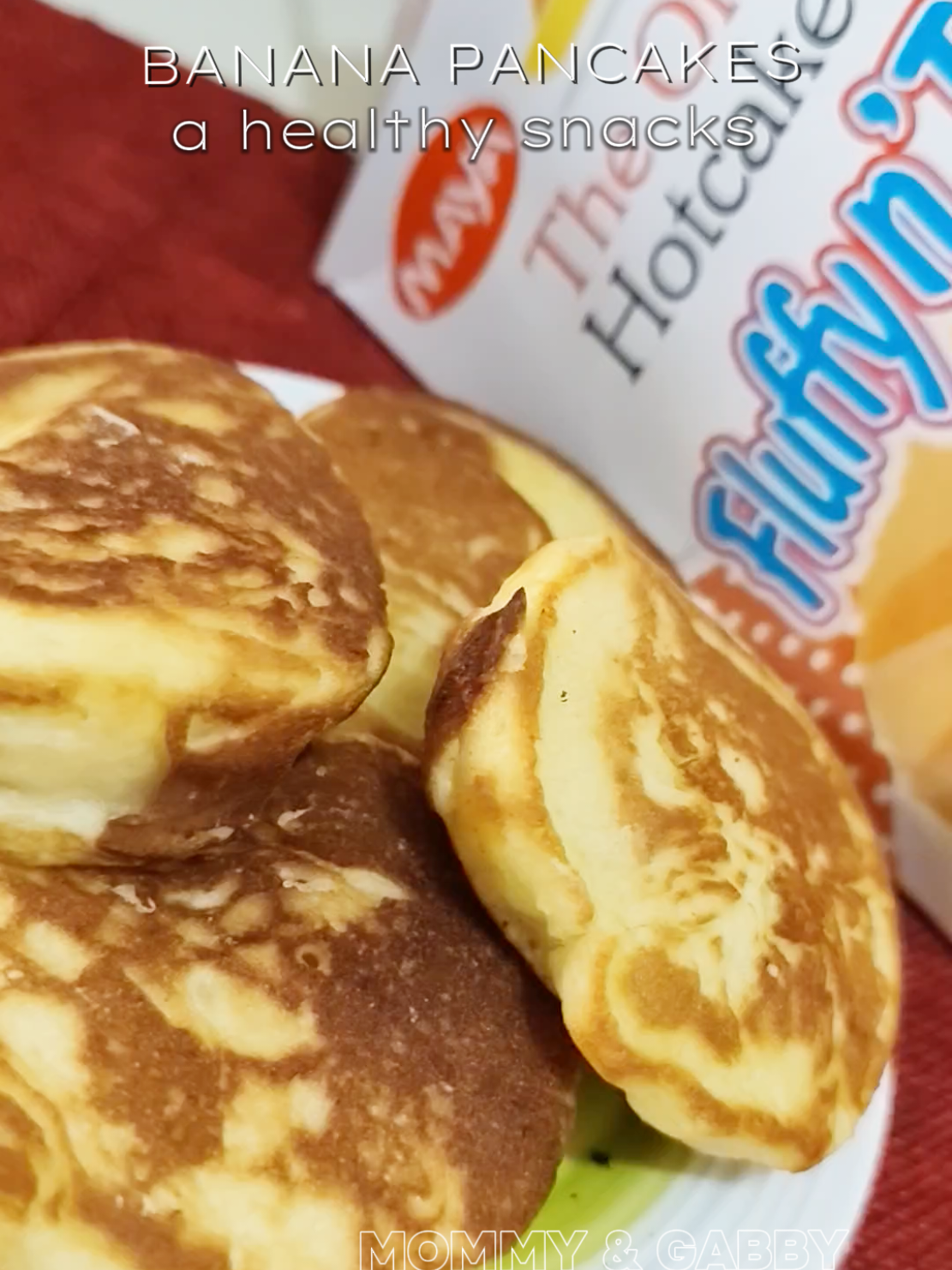 A healthy and easy to prepare snacks for your kids. Here's how ⬇️ 250g MAYA hotcake mix 1pc medium banana (saba/lakatan) 1 medium egg 3/4 cup water (oil or melted butter to grease the pan) 1. Combine all ingredients in a bowl. 2. Mix until well combined and sticky. 3. Preheat the pan and brush with melted butter or oil. 4. Pour 1/8 cup of hotcake mix mixture in a pan or depends on your preferred size of pancake. 5. Flip sides when it looks dry and set. Serve! Yield: 12 pcs pancakes Easy, Right!? Bon Appetit! #mayahotcake #pancakes #bananapancakes #snacks #healthysnacks #kidssnacks 