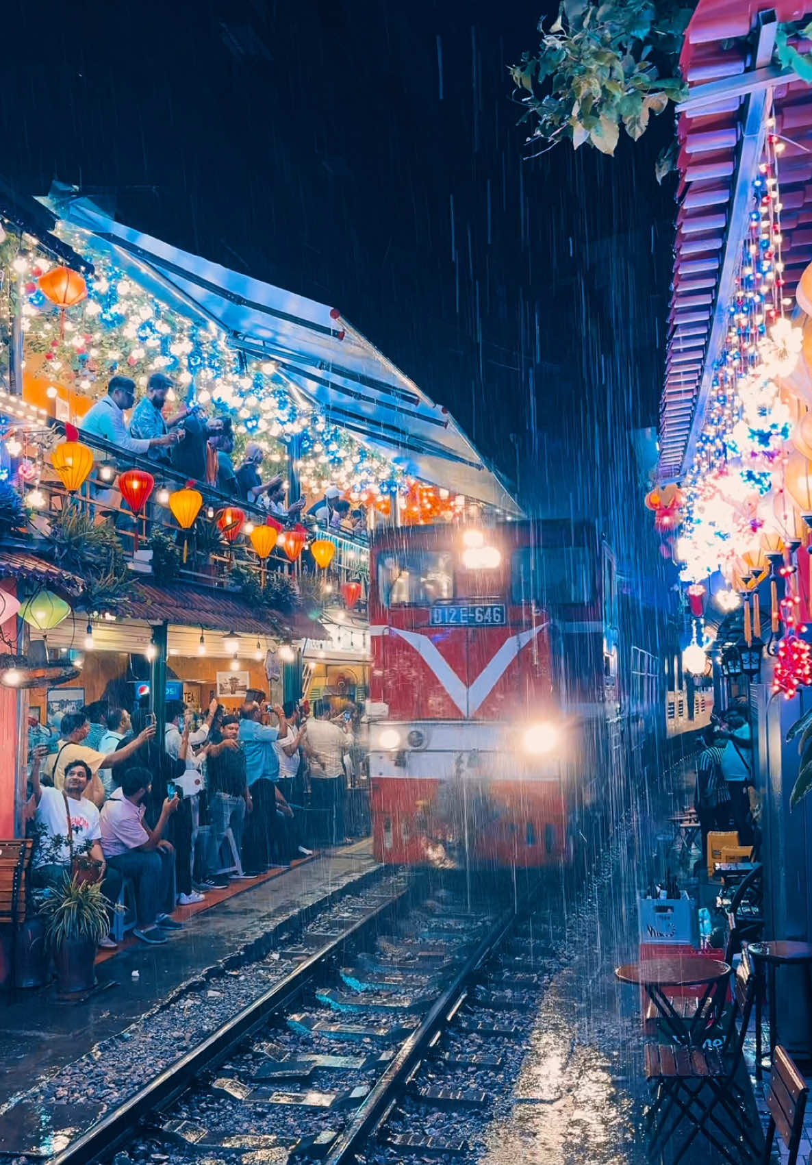 The world speeds past — don’t blink. #trainstreet #hanoi #vietnam #travelvideo #viralvideo #foryou #fyp #foryoupage #cinematic #travelgram #rainynight #nightvibes #urbanexploration #hiddenplaces #asiatravel #bucketlist #lanterns #wowmoment #travelreels #streetlife