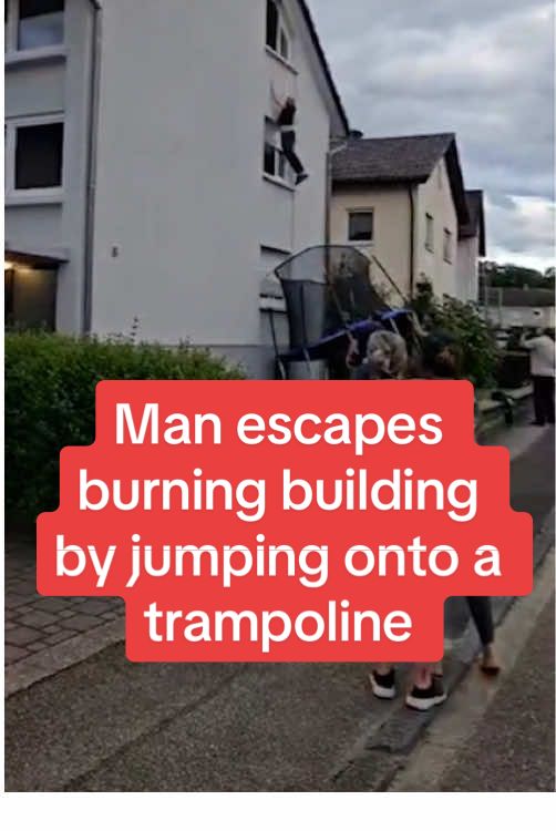 Man escapes burning building by jumping onto a trampoline