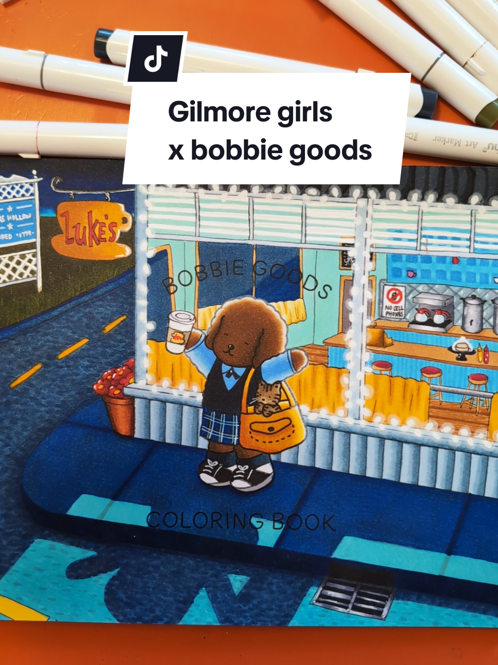 GILMORE GIRLS x BOBBIE GOODS ☕🍂 finally worked up the courage to color the day to night cover page and honestly… kinda proud of it 😭💘felt super intimidating at first but i’m so glad i trusted the process. •inspo: illustration found on Pinterest by gilmoregirlsmx #bobbiegoods #bobbiegoodsart #ohuhu #ohuhuart #gilmoregirls #starshollow #coloring #colouring #bobbiegoodscoloringbook #coloriage #coloringbook #ohuhumarkers #colorwithme #colourwithme #markers #rorygilmore #lukesdinner #lukesdiner #lukes 