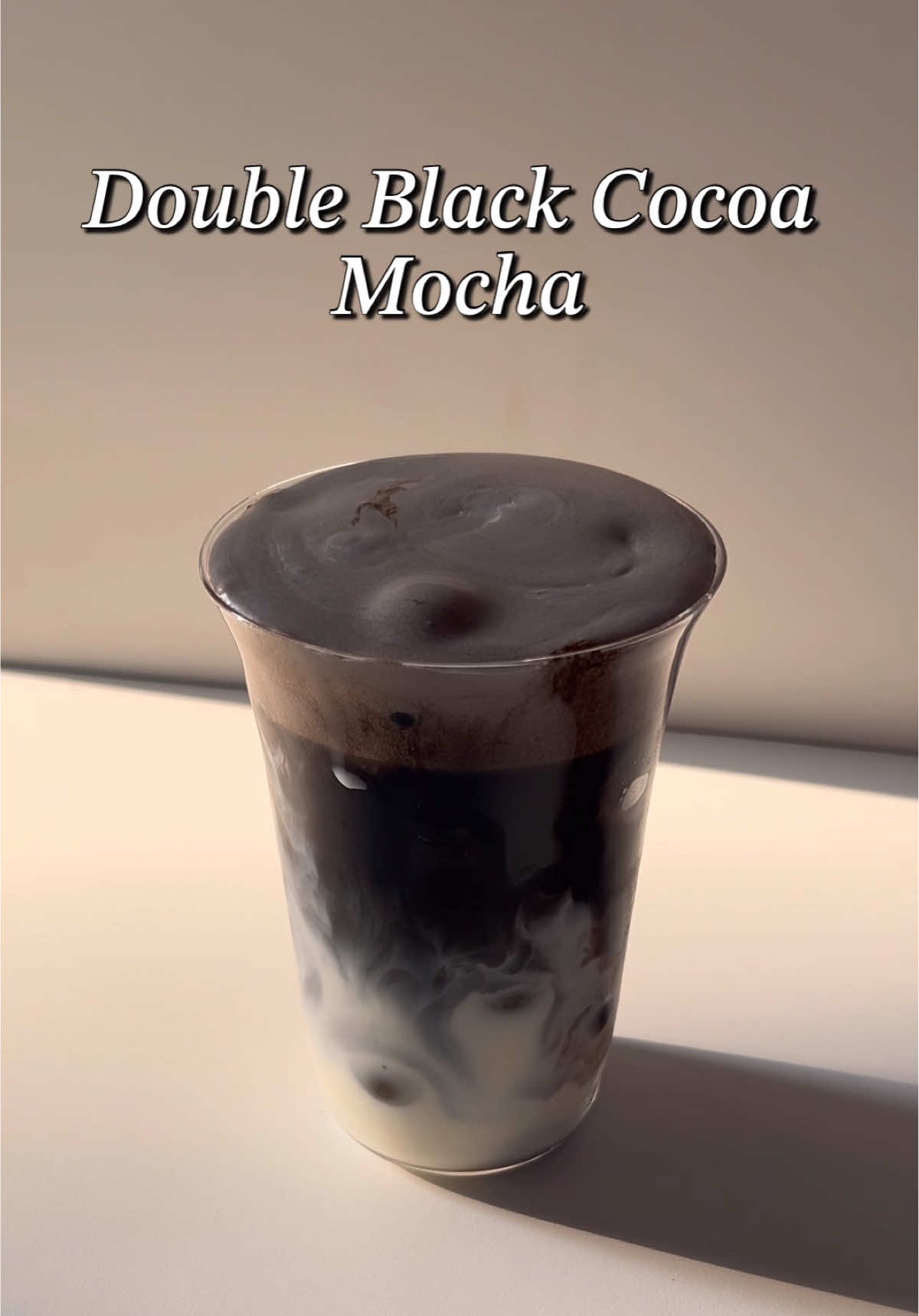 Double Black Cocoa Mocha🖤 Bahan - bahan / Ingredients: 1-2 sdt (tsp) black cocoa powder 1-2 sdt (tsp) instant coffee 50-60 ml air panas / hot water 1-2 sdt (tsp) black cocoa powder 50 ml whipping cream 120 ml susu / milk Ices #homecafe #homecafeindonesia #Recipe #aesthetic #coffee #coffeetime #mocha #icemocha #blackcocoa #fyp 