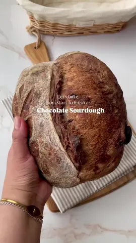 Chocolate Sourdough! I absolutely loved it! Most delicious bread ever!  Ingredientes: 274g water 74g starter 370g bread flour 20 g cocoa chocolate powder  9g of salt Half a bar of dark chocolate. 👉🏼 *(I susbtracted 20 g of flour and replaced it with the cocoa chocolate powder). Optional: I made a paste with the cocoa powder and water).  Here’s how I did it: -Add water, starter and flour and mix it all well. -Rest 30 minutes.  -Add salt and incorporate well. And then do 1st stretch and fold.  -Continue with 2 rounds of stretch and folds every 30 min.  -On the 2nd stretch and fold add the chocolate pieces. -2 coil folds every 30 min.  -Bulk fermentation 2 hrs at room temp.  -if you’re adding the chocolate paste, add it during lamination. -Pre shape, 15 min bench rest. -Cold fermentation for 15 - 24 hrs. -Preheat oven at 495F for 45 min. -Bake 495F for 20 min. Lid on and 450F for 20 min lid off. Cool down a bit and enjoy! #sourdough #fyp #sourdoughbread 