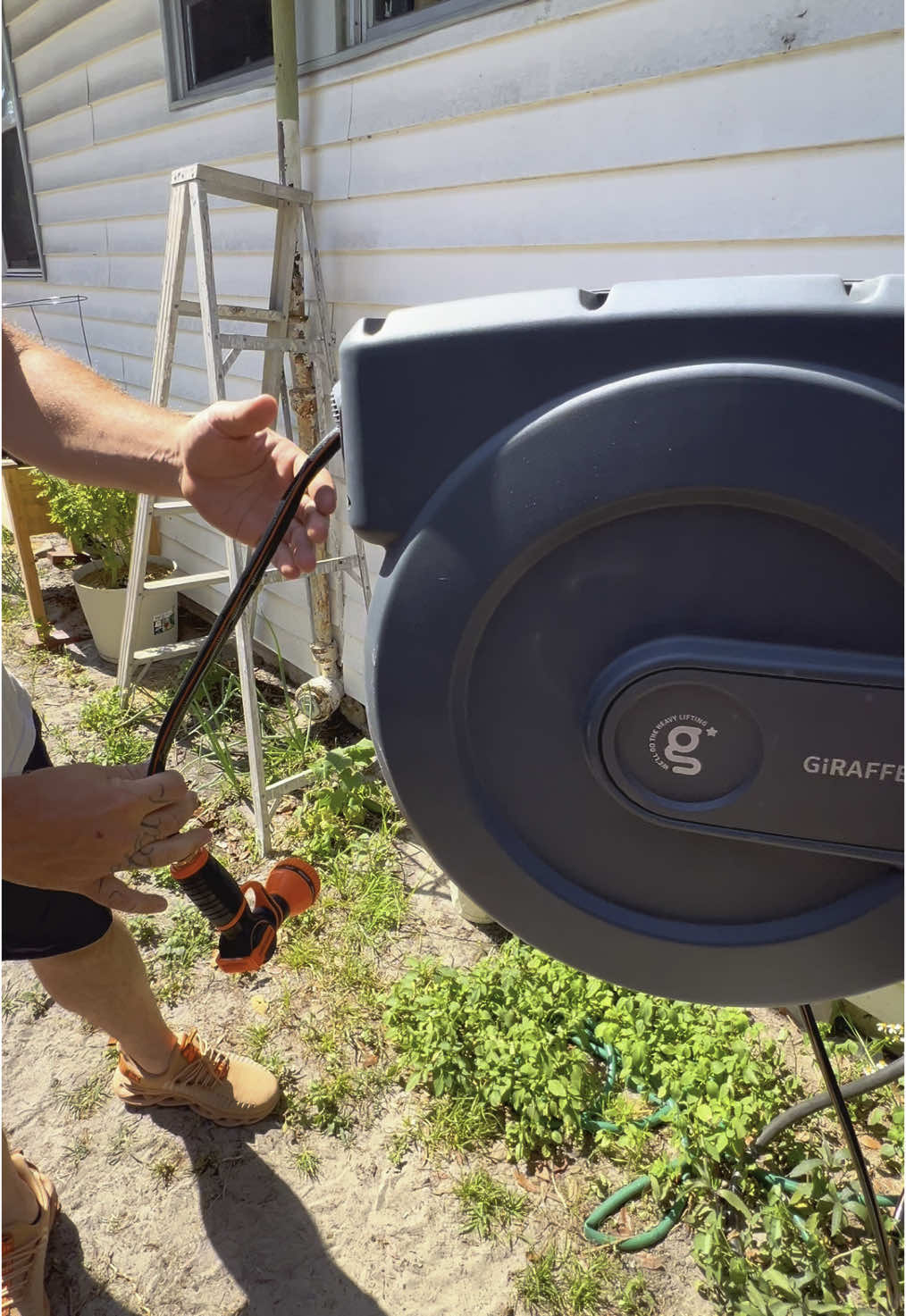 155’ retractable garden hose reel. #giraffetools @Giraffe-Tools #gardening #gardenhose #springsavings #Outdoors #backyarddiy #retractablegardenhosereel  