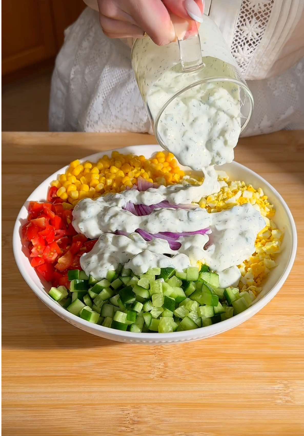 Creamy Crunchy Cucumber Corn Salad | High-Protein, Dairy-Free, Easy Meal Prep (Dairy-Free Tzatziki Version) 🛒 Ingredients (Serves 2–3):  • 1½ cups finely chopped cucumber  • 1 cup finely chopped tomatoes  • 1 cup sweet corn (cooked or canned, drained)  • 5 hard-boiled eggs, finely chopped  • ¼ red onion, thinly sliced  • ¾ cup dairy-free tzatziki (recipe below)     – ½ cup unsweetened coconut yogurt    – 1 small cucumber, grated and squeezed dry    – 1 clove garlic, minced    – 1 tbsp lemon juice    – 1 tbsp chopped fresh dill (or 1 tsp dried dill)    – Salt to taste 👩‍🍳 Instructions:      1️⃣ Prepare all ingredients:  • Finely chop cucumber, tomatoes, and eggs. Thinly slice the red onion.  • Drain the corn if using canned.      2️⃣ Make the dairy-free tzatziki:  • In a bowl, mix ½ cup coconut yogurt (unsweetened), 1 small grated cucumber (squeeze out water), 1 clove minced garlic, 1 tablespoon lemon juice, 1 tablespoon chopped fresh dill (or 1 tsp dried dill), salt to taste.      3️⃣ Assemble the salad:  • In a large mixing bowl, add cucumbers, tomatoes, corn, chopped eggs, and red onion.  • Pour in ¾ cup of the dairy-free tzatziki and gently toss until well combined.      4️⃣ Chill and serve:  • Refrigerate for 15–30 minutes for the flavors to blend, or enjoy immediately! ⸻ ✨ Benefits of This Dish:  • High in protein from eggs  • Hydrating and vitamin-rich from cucumber and tomatoes  • Naturally gluten-free and dairy-free  • Supports digestion with probiotic-rich coconut yogurt  • Easy to prep ahead for lunches or snacks ⸻ ✅ Tips: 	•	Chop finely for the best creamy texture and perfect bite. 	•	Squeeze cucumber before adding to tzatziki to avoid watery dressing. 	•	Use fresh dill if possible for a bright, authentic tzatziki flavor. 	•	If meal prepping, store the dressing separately and mix before eating for maximum crunch! ⸻ #ChoppedSalad #MealPrep #DairyFreeTzatziki #HealthyLunchIdeas #HighProteinMeal #GlutenFreeSalad #EasyHealthyRecipes #EggSaladUpgrade #FreshAndSimple #CucumberSalad #CleanEating #QuickMealPrep #NoDairy #WholeFoodRecipes #simpleanddelicious 