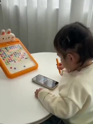 Mess-free fun for kids. Boost creativity and motor skills with this magnetic dot board for toddlers.